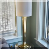 DL08. Pair of Virtual Comfort contemporary goldtone candlestick lamps. 33”h 